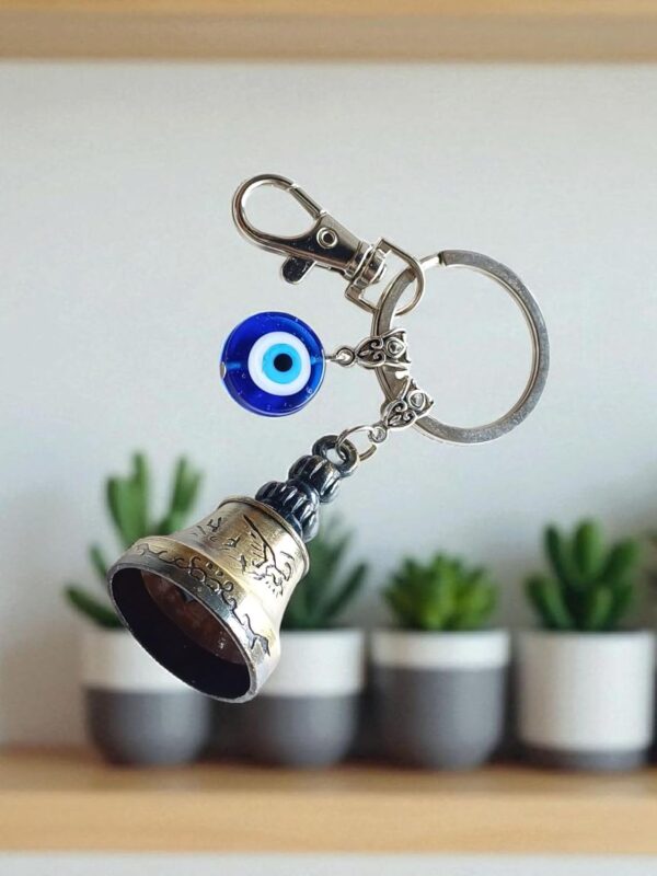 SHILPMART Guardian Golden Bell KeyChain Tibetan Decorative Temple Belll with Evil Eye & Black Hook Metal Keyring Good Luck Negative Energy Protection (Pack-1)
